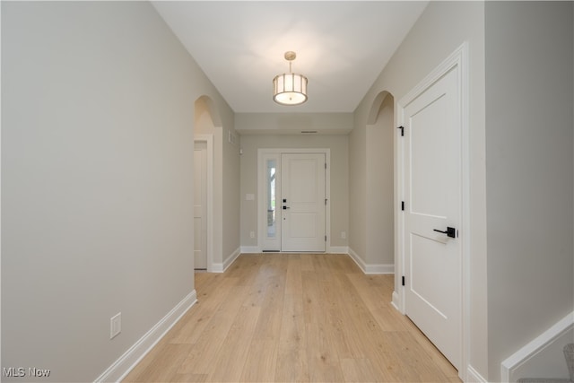 doorway to outside with light hardwood / wood-style flooring