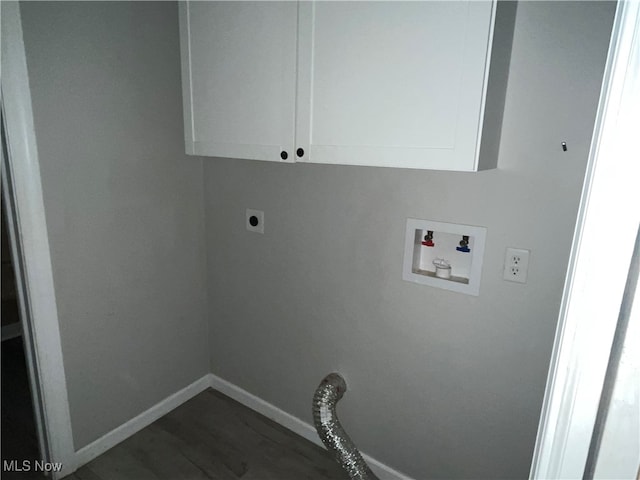 washroom with washer hookup, cabinets, and electric dryer hookup