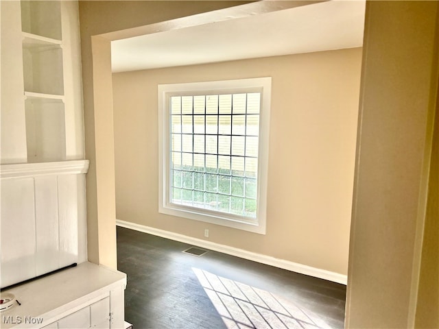 interior space with hardwood / wood-style flooring