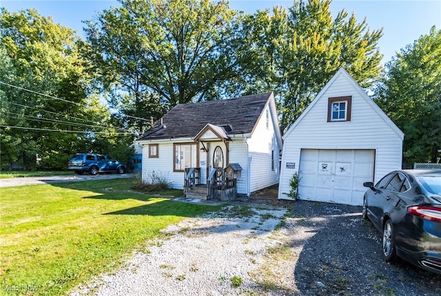 view of front of home featuring a garage and a front yard