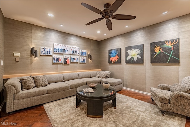 living room with hardwood / wood-style floors and ceiling fan