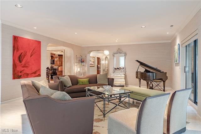 living room featuring plenty of natural light and crown molding