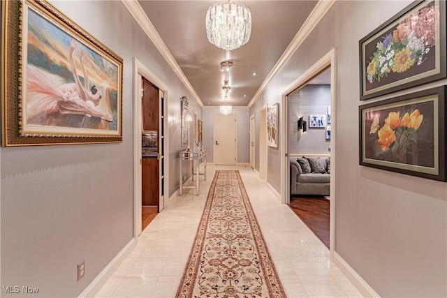 27500 Cedar Rd Unit T-8, Beachwood, OH 44122 - corridor with ornamental molding, a chandelier, light tile patterned flooring, and baseboards