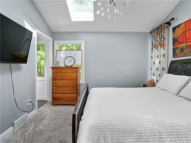 carpeted bedroom featuring vaulted ceiling