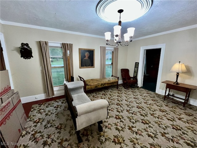 living area featuring carpet floors, ornamental molding, a textured ceiling, and a chandelier