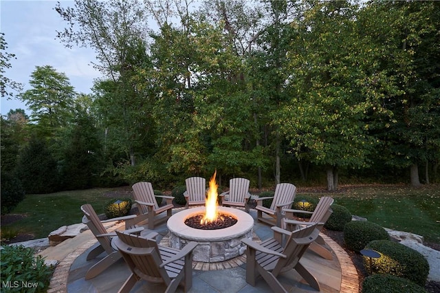 view of patio / terrace featuring a fire pit