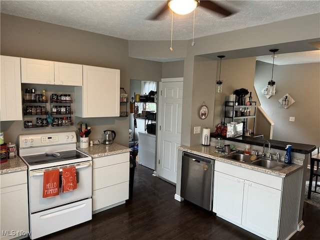 kitchen featuring stainless steel dishwasher, white cabinets, sink, dark hardwood / wood-style flooring, and electric stove