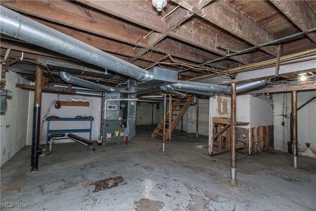 basement featuring heating unit