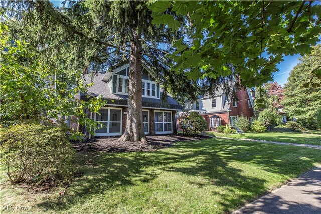 view of front of home with a front yard