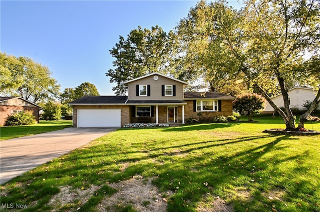 tri-level home with a front lawn, covered porch, and a garage