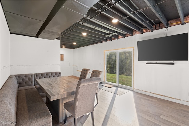 dining area with wood-type flooring