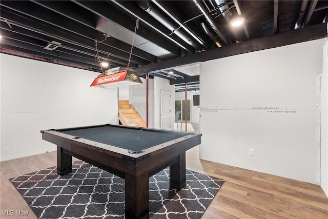 game room featuring hardwood / wood-style flooring and pool table