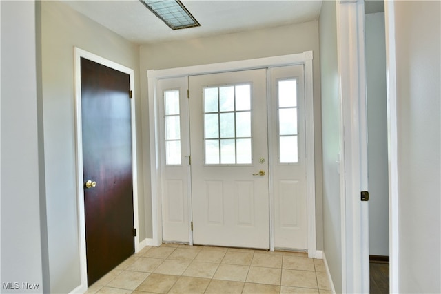 view of tiled foyer entrance