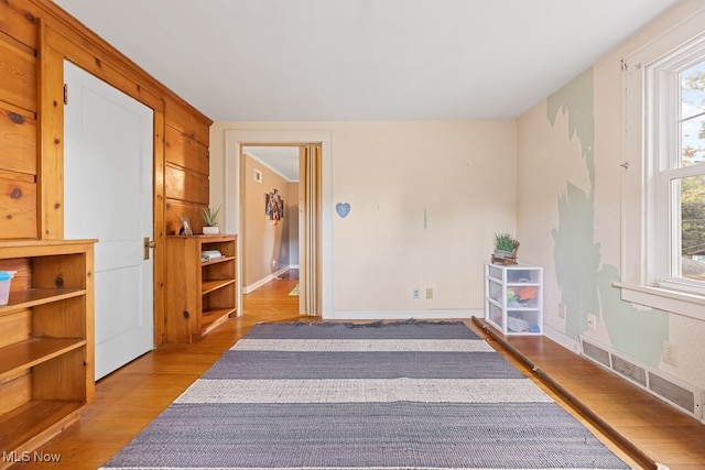 bedroom with light hardwood / wood-style floors