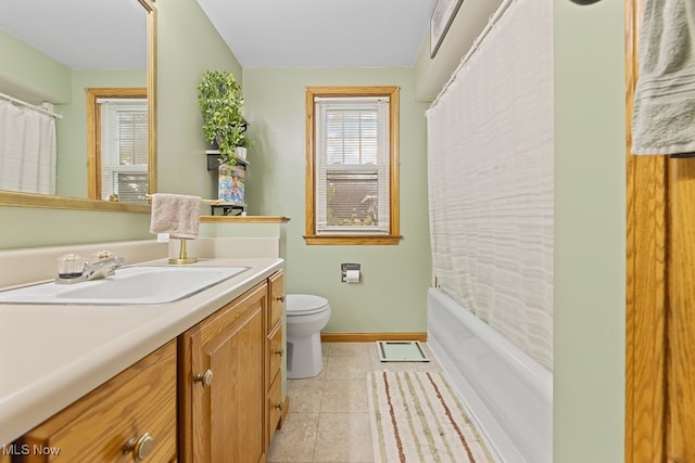 full bathroom featuring shower / bath combination with curtain, tile patterned floors, toilet, and vanity