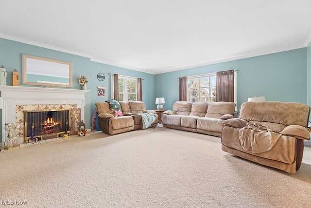 living room with ornamental molding, carpet, and a healthy amount of sunlight