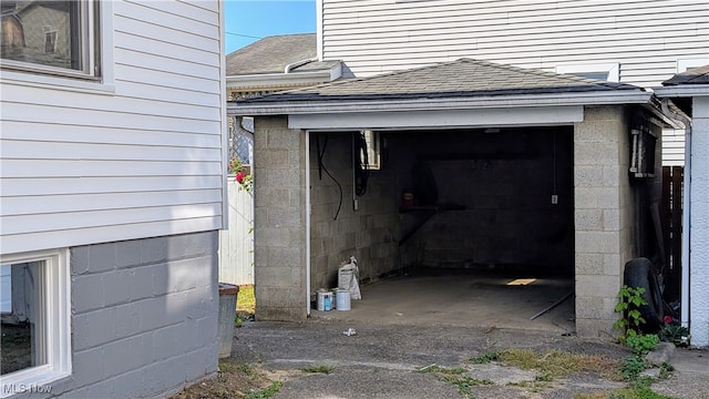 view of side of property featuring a garage