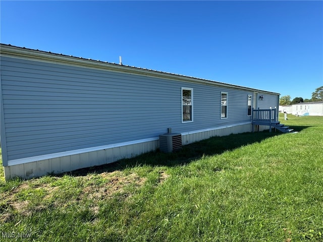 view of property exterior featuring a yard