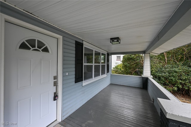 wooden terrace with covered porch