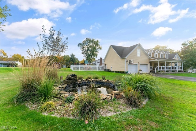 view of yard featuring a garage