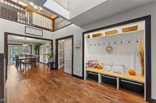 mudroom with hardwood / wood-style floors