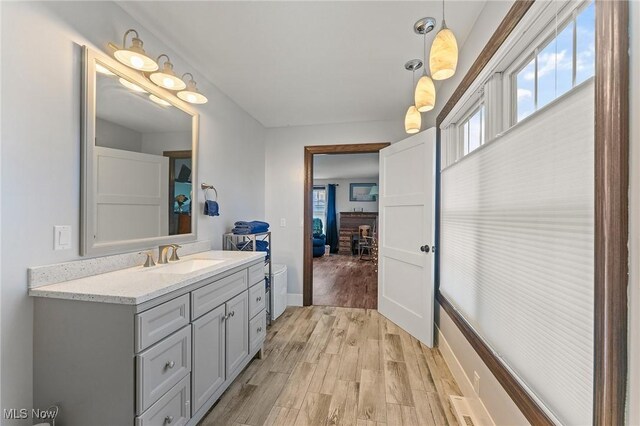 bathroom with vanity and hardwood / wood-style floors