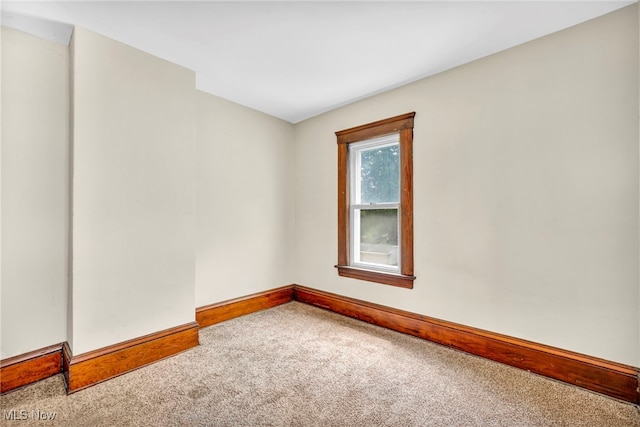 empty room with carpet flooring