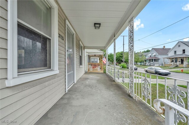 view of patio featuring a porch