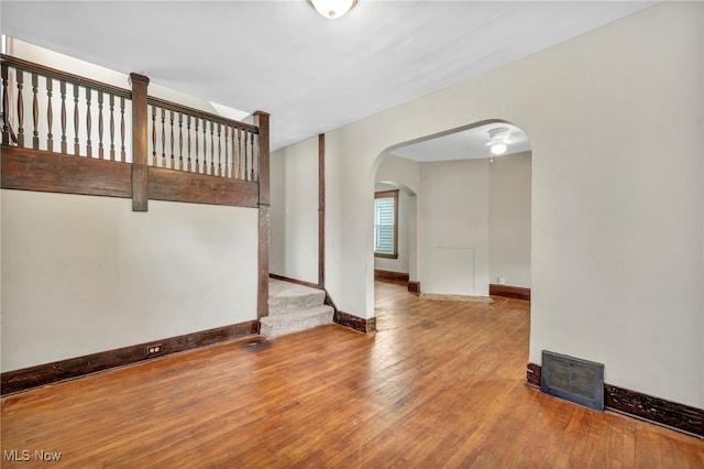 spare room with wood-type flooring