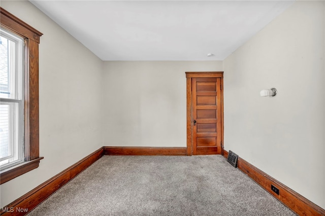 view of carpeted spare room