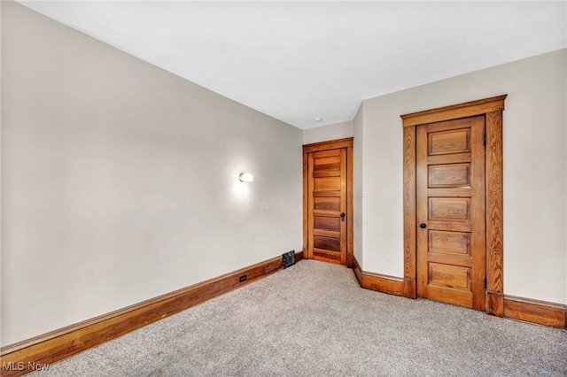 bedroom with light colored carpet