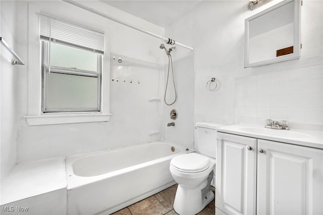 full bathroom featuring decorative backsplash, toilet, tile patterned floors, washtub / shower combination, and vanity