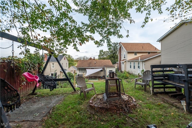 view of yard featuring a wooden deck