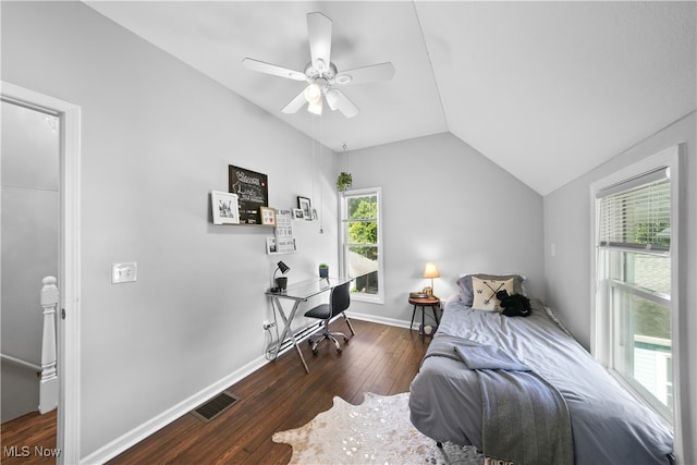 bedroom featuring lofted ceiling, dark hardwood / wood-style floors, and ceiling fan