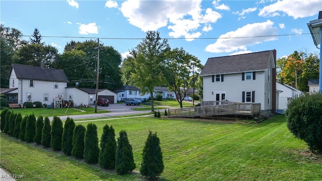 view of yard featuring a deck