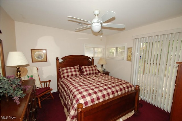 bedroom featuring ceiling fan and access to outside