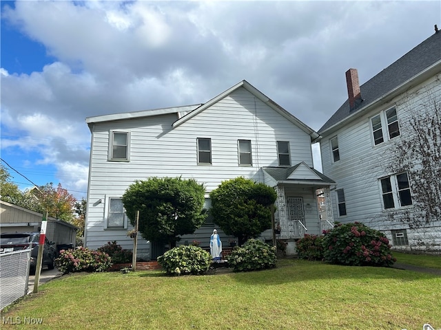 view of front of house with a front lawn