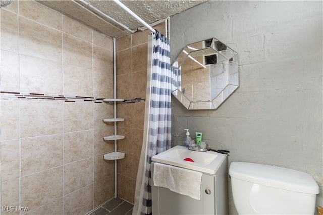 bathroom featuring vanity, toilet, and a shower with curtain