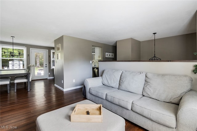 living room featuring dark hardwood / wood-style floors