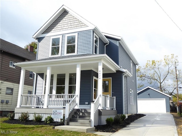 4424 W 53rd St, Cleveland, OH 44109 - american foursquare style home with a porch, an outdoor structure, and a garage