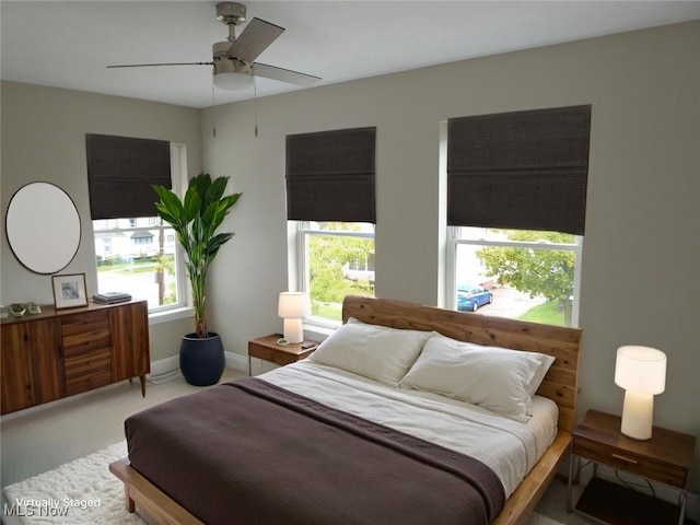 4424 W 53rd St, Cleveland, OH 44109 - carpeted bedroom featuring ceiling fan and baseboards