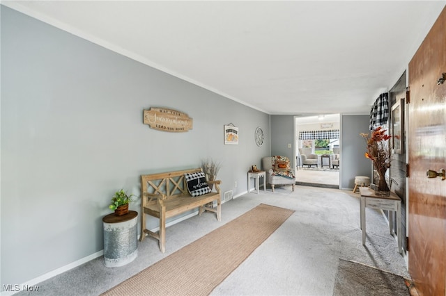 living area with light colored carpet