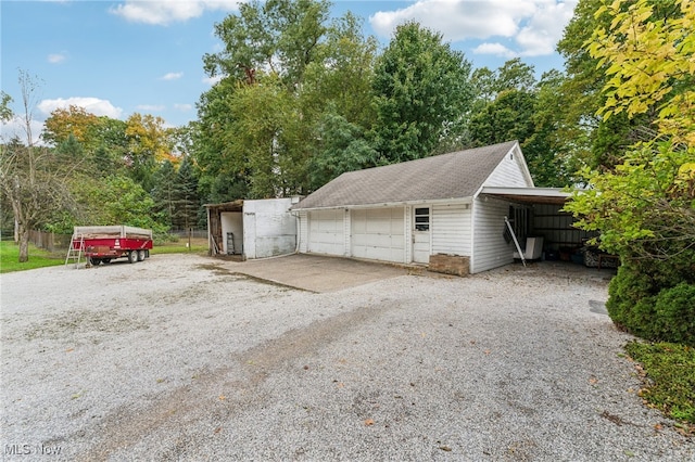 garage with a carport