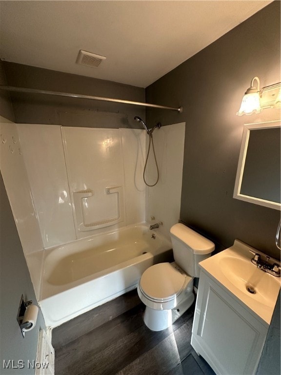 full bathroom with vanity, toilet, and shower / bathtub combination