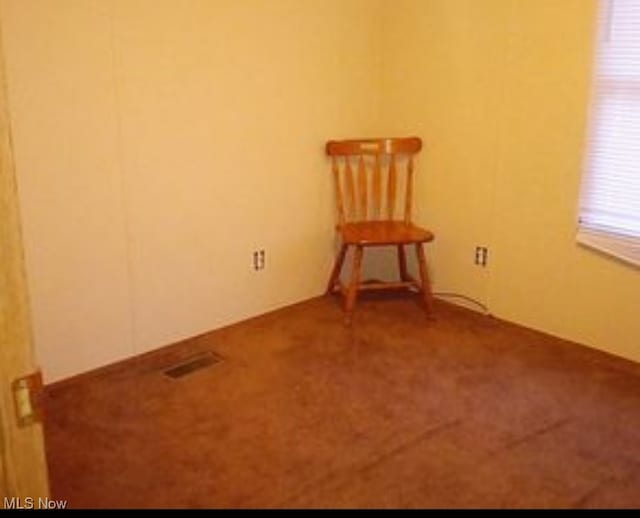 empty room with carpet floors