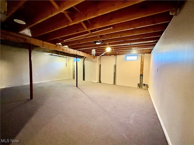 basement featuring carpet floors