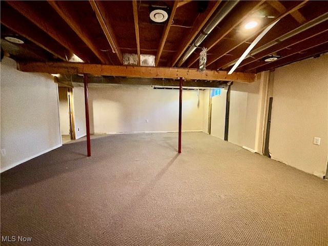 basement featuring carpet flooring