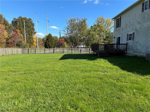 view of yard featuring a deck