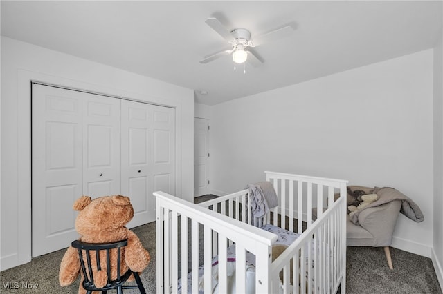 bedroom with dark carpet, a closet, and ceiling fan