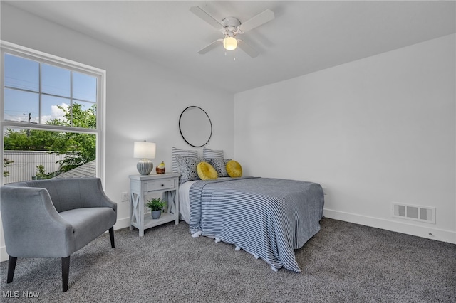 bedroom featuring ceiling fan and carpet flooring